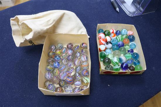 A 19th century solitaire board with latticino marbles and other antique marbles